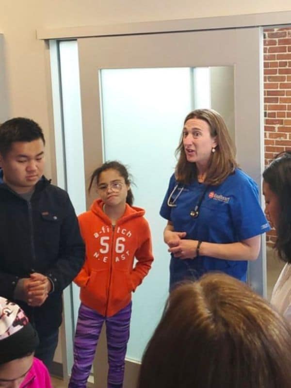 vet team giving tours to students